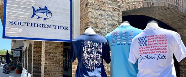 southern tide exterior sign with red white and blue flag shirts