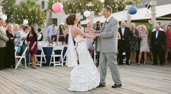 Married couple dancing at outdoor wedding